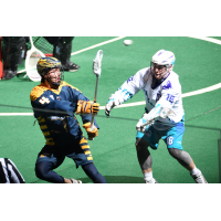 Lyle Thompson of the Georgia Swarm passes against the Rochester Knighthawks