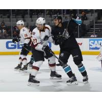 Cleveland Monsters Center Calvin Thurkauf holds back the San Jose Barracuda