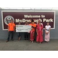 Check Presentation for Kanga Roof Gives Away at Geneva Red Wings McDonough Park