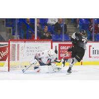 Kaleb Bulych of the Vancouver Giants scores against the Kamloops Blazers