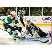 San Antonio Rampage goaltender Ville Husso makes a save on Ben Gleason of the Texas Stars