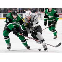 Nolan Stevens of the San Antonio Rampage (58) battles against Texas Stars defenseman Ben Gleason