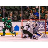 Joey LaLeggia defends the front of the San Antonio Rampage net against Roope Hiintz of the Texas Stars