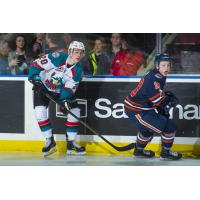 Kelowna Rockets LW Conner Bruggen-Cate (left) against the Kamloops Blazers