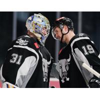 Mackenzie MacEachern and Jordan Binnington celebrate the San Antonio Rampage's seventh straight win at home