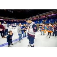 Tulsa Oilers forward Charlie Sampair signs autographs after the game