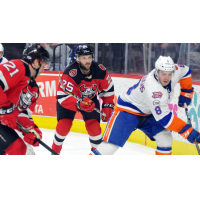 Blake Speers and Kevin Rooney (25) of the Binghamton Devils against the Bridgeport Sound Tigers