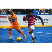 Kansas City Comets forward Anthony Grant (right) vs. the Florida Tropics