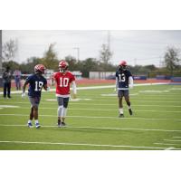 At Memphis Express practice, Troy Cook talks with Ryan Timmons