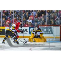 Niagara IceDogs take a shot against the Kingston Frontenacs