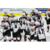 Vancouver Giants exchange congratulations after defeating the Kamloops Blazers