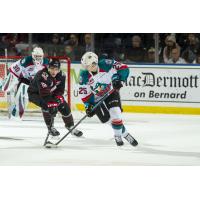 Kelowna Rockets centre Kyle Crosby handles the puck against the Prince George Cougars