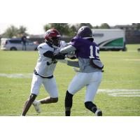 Channing Stribling of the Memphis Express (left) in a joint practice with the Atlanta Legends