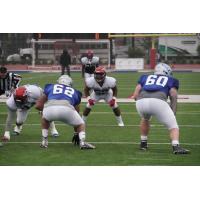 Anthony Rhone of the Memphis Express meets the Salt Lake Stallions in a joint practice