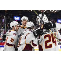 Cleveland Monsters celebrate a goal against the Laval Rocket