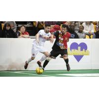 Adriano Dos Santos of the Baltimore Blast (right) defends against the Harrisburg Heat