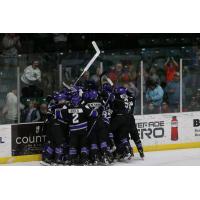 Tri-City Storm celebrate against the Muskegon Lumberjacks