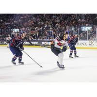 Utah Grizzlies forward Austin Carroll (21) against the Tulsa Oilers