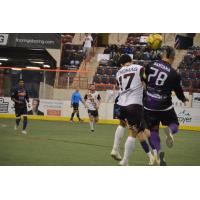 Jamie Thomas of the Baltimore Blast battles the Harrisburg Heat