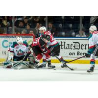 Vancouver Giants right wing Jared Dmytriw in front of the Kelowna Rockets' net