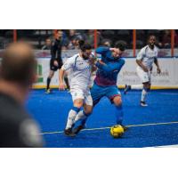 Kansas City Comets defender John Sosa (right) against the Mississauga MetroStars