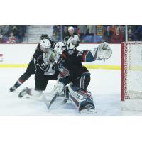 Kelowna Rockets goaltender Roman Basran stops the Vancouver Giants