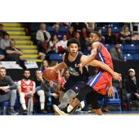 Halifax Hurricanes guard Malcolm Duvivier drives around the Cape Breton Highlanders