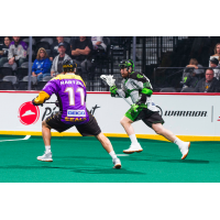 Saskatchewan Rush forward Ben McIntosh attacks the San Diego Seals