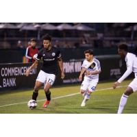 Tacoma Defiance defender Saad Abdul-Salaam (left)