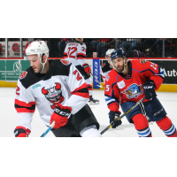 Binghamton Devils center Egor Sharangovich (left) vs. the Springfield Thunderbirds