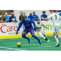 Kansas City Comets defender James Togbah intercepts a Florida Tropics pass