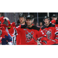 Binghamton Devils forward Ludvig Larsson receives congratulations