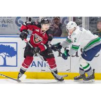 Vancouver Giants left wing Owen Hardy (left) vs. the Seattle Thunderbirds