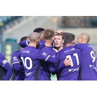 Louisville City players congratulate Magnus Rasmussen for his goal vs. Birmingham Legion FC Sunday at Louisville Slugger Field