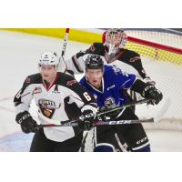 Vancouver Giants defenceman Dylan Plouffe (left) against the Victoria Royals