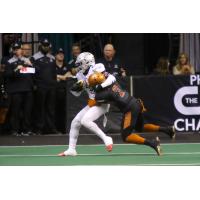 Jamal Miles of the Arizona Rattlers makes a tackle against the San Diego Strike Force