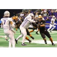 Chris McAllister of the Arizona Rattlers rushes from the edge against the San Diego Strike Force