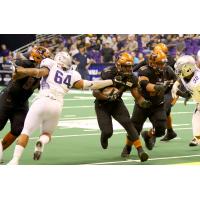 Darrell Monroe of the Arizona Rattlers runs the ball against the San Diego Strike Force