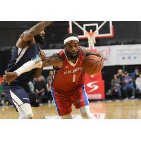 Cape Breton Highlanders guard Bruce Massey drives against the Halifax Hurricanes