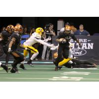 Arizona Rattlers run against the Tucson Sugar Skulls