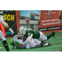 Green Bay Blizzard complete a tackle against the Nebraska Danger