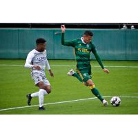 Sacramento Republic FC defender Shannon Gomez (left) vs. Portland Timbers 2