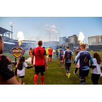 El Paso Locomotive FC and Phoenix Rising FC enter the pitch