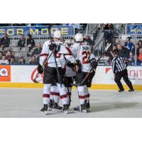 Cleveland Monsters exchange congratulations after a score