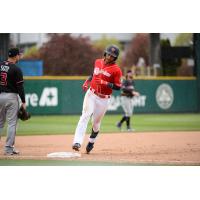Tim Lopes of the Tacoma Rainiers rounds the bases