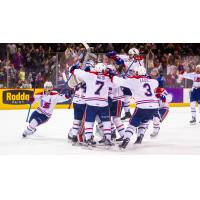 Spokane Chiefs celebrate after advancing past the Everett Silvertips