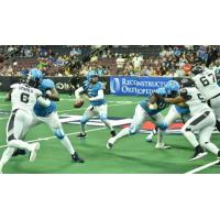 Philadelphia Soul quarterback Dan Raudabaugh drops back against the Columbus Destroyers