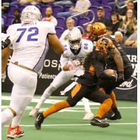 Arizona Rattlers carry the ball against the San Diego Strike Force