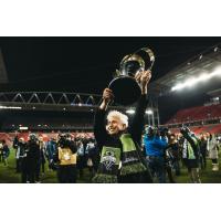 Seattle Sounders FC founding owner Joe Roth raises the MLS Cup following Seattle's victory over Toronto FC in 2016
