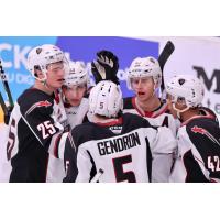 Vancouver Giants huddle up to celebrate a goal